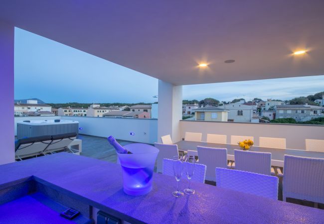 Villa with pool for 12 people in Son Serra, Mallorca. 6 DBR, 7 BR, AC, fitness pool, roof terrace with heated whirlpool, music/light-system, bikes.