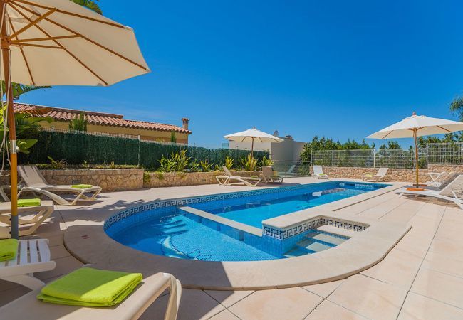 Villa with pool for 10 persons in Alcanada, Mallorca. 5 DBR, 5 BR en suite, AC, free wifi, pool, SPA area with heated indoor pool and whirlpool, fitness and many extras