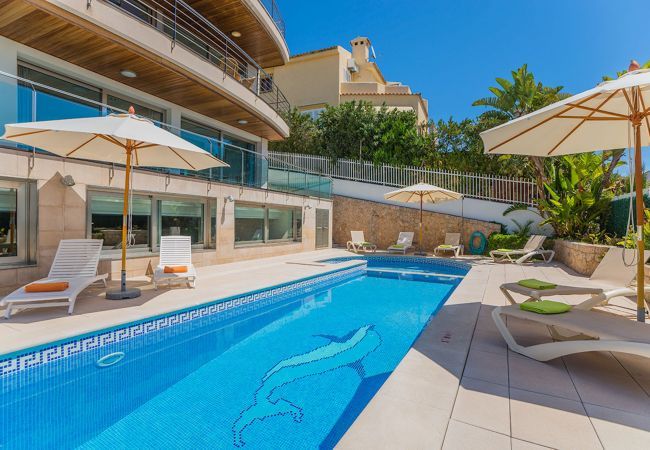 Villa with pool for 10 persons in Alcanada, Mallorca. 5 DBR, 5 BR en suite, AC, free wifi, pool, SPA area with heated indoor pool and whirlpool, fitness and many extras