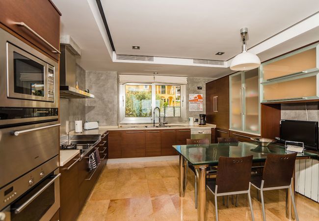 Villa with pool for 10 persons in Alcanada, Mallorca. 5 DBR, 5 BR en suite, AC, free wifi, pool, SPA area with heated indoor pool and whirlpool, fitness and many extras