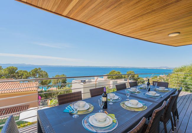 Villa with pool for 10 persons in Alcanada, Mallorca. 5 DBR, 5 BR en suite, AC, free wifi, pool, SPA area with heated indoor pool and whirlpool, fitness and many extras