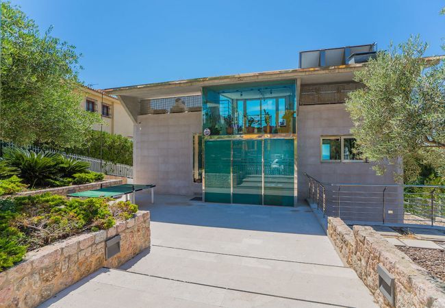 Villa with pool for 10 persons in Alcanada, Mallorca. 5 DBR, 5 BR en suite, AC, free wifi, pool, SPA area with heated indoor pool and whirlpool, fitness and many extras