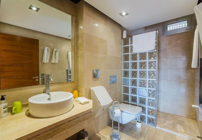 Villa with pool for 10 persons in Alcanada, Mallorca. 5 DBR, 5 BR en suite, AC, free wifi, pool, SPA area with heated indoor pool and whirlpool, fitness and many extras