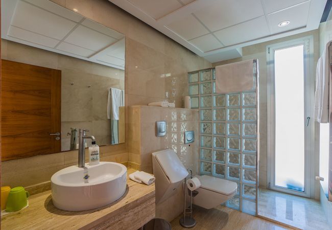 Villa with pool for 10 persons in Alcanada, Mallorca. 5 DBR, 5 BR en suite, AC, free wifi, pool, SPA area with heated indoor pool and whirlpool, fitness and many extras
