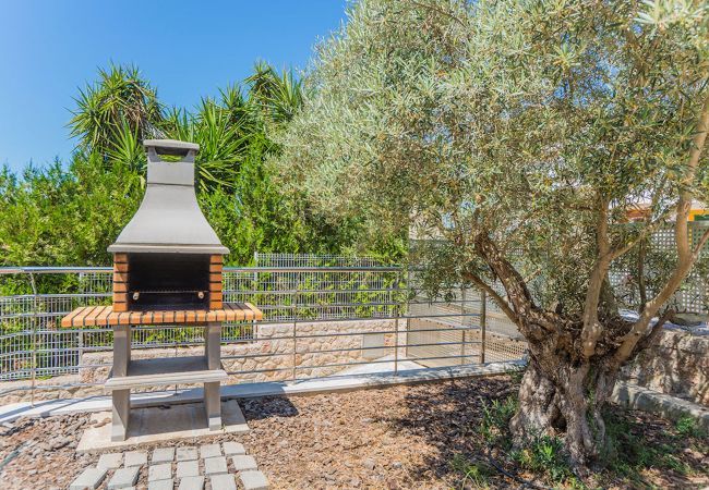 Villa with pool for 10 persons in Alcanada, Mallorca. 5 DBR, 5 BR en suite, AC, free wifi, pool, SPA area with heated indoor pool and whirlpool, fitness and many extras