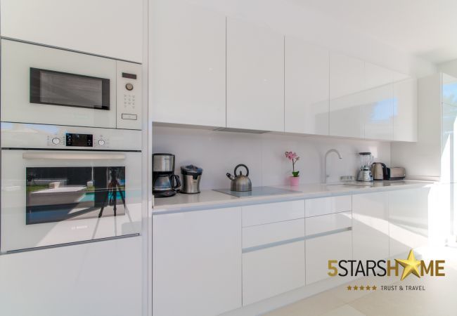 Villa with pool for 8 people in Playa de Muro, Mallorca 4 double bedrooms, 3 bathrooms, garden with pool, barbecue, free WIFI, air conditioning and central heating.