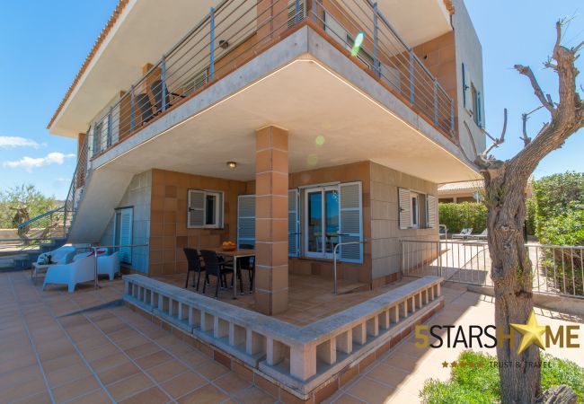 Beach house for 10 adults and babies in Son Serra de Marina. 5 DBR, 3 bathrooms, 1 full outdoor bathroom, AC, free wifi internet, pool with barbecue terrace.