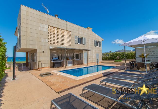 Beach house for 10 adults and babies in Son Serra de Marina. 5 DBR, 3 bathrooms, 1 full outdoor bathroom, AC, free wifi internet, pool with barbecue terrace.