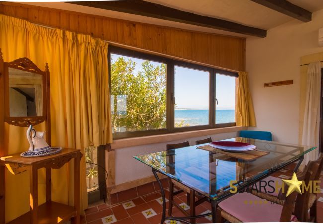House facing the sea for 6 adults + babies in Colonia de Sant Pere. 3 DBR, 2 bathrooms, AC ( cold/warm), satellite tv, free wifi internet, terraces and garden, unforgettable sea views