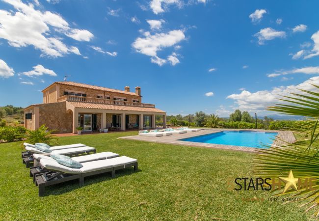 Villa with pool for 12 persons in Sant Jordi, Mallorca 6 DBR, 6 bathrooms en suite, 1 extra bathroom, AC, free Wifi, music system, garden, pool, BBQ and relaxation areas.
