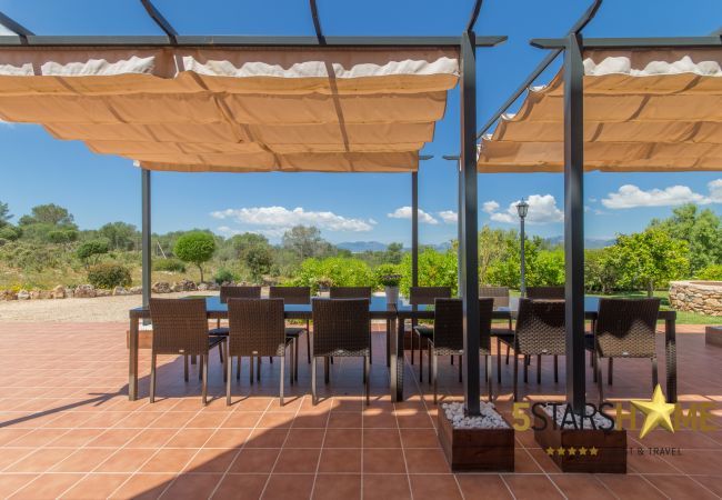Villa with pool for 12 persons in Sant Jordi, Mallorca 6 DBR, 6 bathrooms en suite, 1 extra bathroom, AC, free Wifi, music system, garden, pool, BBQ and relaxation areas.