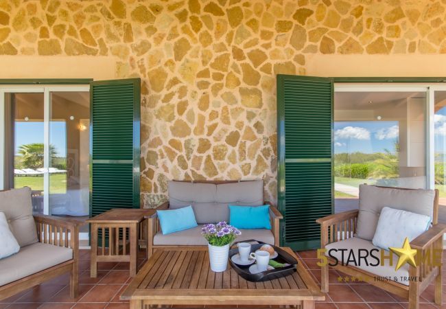 Villa with pool for 12 persons in Sant Jordi, Mallorca 6 DBR, 6 bathrooms en suite, 1 extra bathroom, AC, free Wifi, music system, garden, pool, BBQ and relaxation areas.