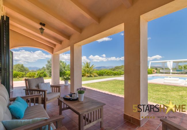 Villa with pool for 12 persons in Sant Jordi, Mallorca 6 DBR, 6 bathrooms en suite, 1 extra bathroom, AC, free Wifi, music system, garden, pool, BBQ and relaxation areas.