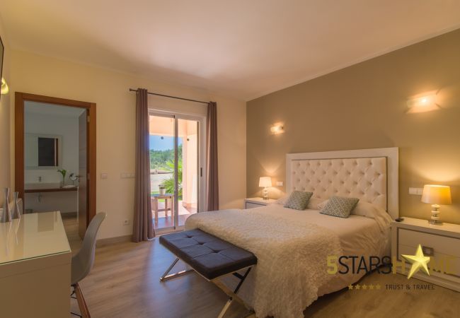 Villa with pool for 12 persons in Sant Jordi, Mallorca 6 DBR, 6 bathrooms en suite, 1 extra bathroom, AC, free Wifi, music system, garden, pool, BBQ and relaxation areas.