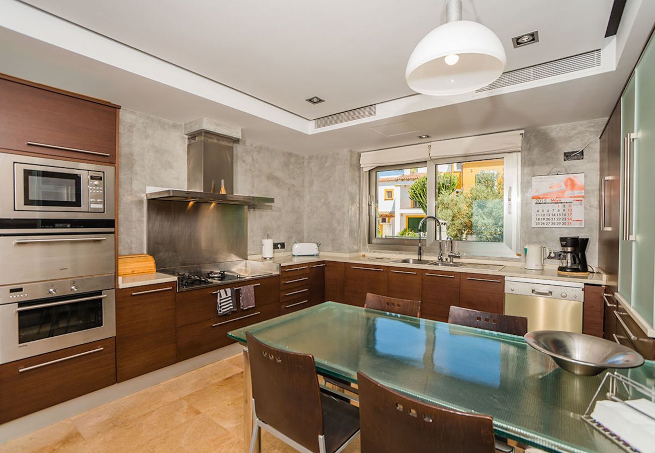 Villa with pool for 10 persons in Alcanada, Mallorca. 5 DBR, 5 BR en suite, AC, free wifi, pool, SPA area with heated indoor pool and whirlpool, fitness and many extras