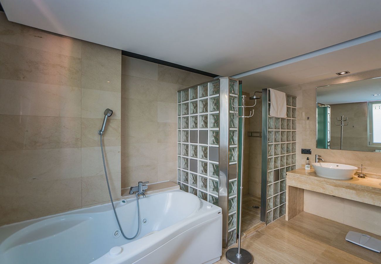 Villa with pool for 10 persons in Alcanada, Mallorca. 5 DBR, 5 BR en suite, AC, free wifi, pool, SPA area with heated indoor pool and whirlpool, fitness and many extras